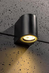 Black curved outdoor wall light – angled view